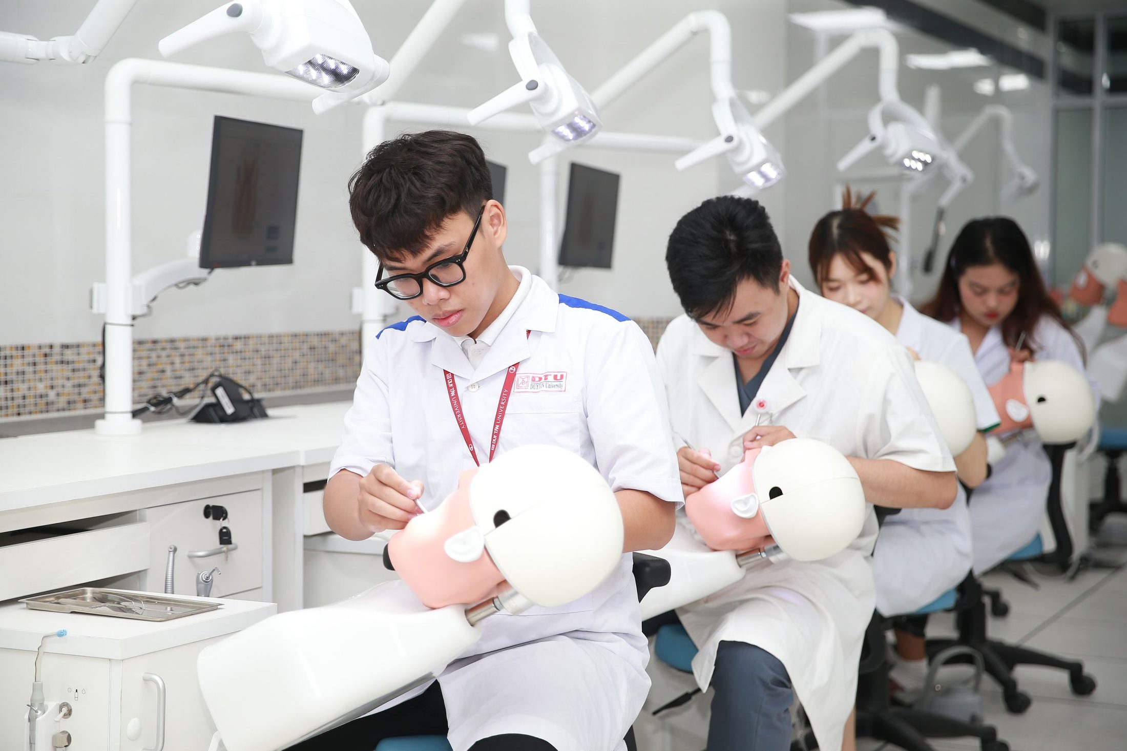 Dental students training on simulation mannequins
